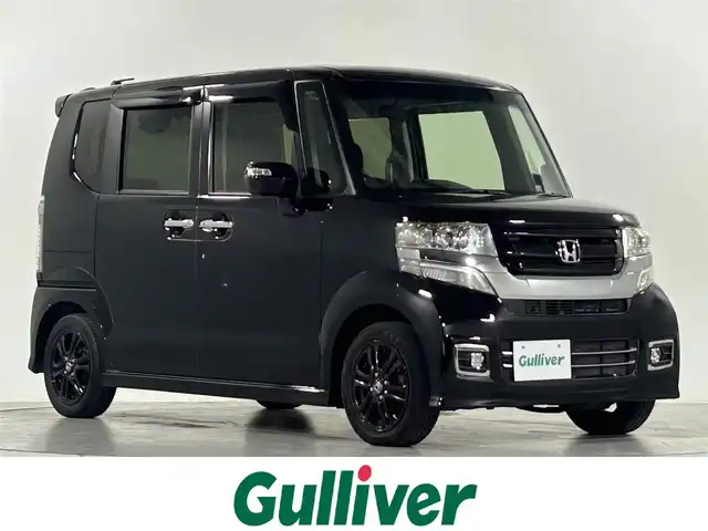 ホンダ Ｎ ＢＯＸ カスタム SSブラックSパッケージ 佐賀県 2016(平28)年 5.6万km クリスタルブラックパール 純正8インチナビ/フルセグTV/CD/DVD/Bluetooth/バックカメラ/横滑り防止装置/オートライト/HIDヘッドライト/フォグライト/ビルトインETC/両側パワースライドドア/運転席・助手席シートヒーター/後席サンシェード/シートバックテーブル/純正フロアマット/ISOFIX対応シート/電動格納ミラー/純正14インチアルミホイール