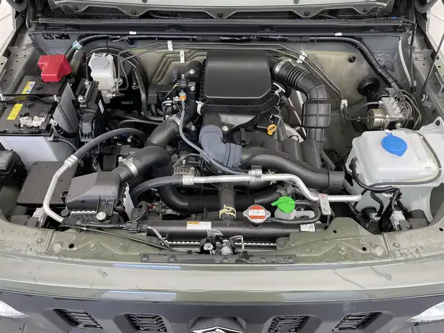 スズキ ジムニー XC 滋賀県 2023(令5)年 0.2万km ジャングルグリーン 禁煙車/社外ナビ/Bluetooth/バックカメラ/ドライブレコーダー/ＬＥＤライト/シートヒーター/スズキセーフティサポート/・デュアルセンサーブレーキサポート/・誤発進抑制機能/・車線逸脱警報機能/・ふらつき警報機能/・先行車発進お知らせ機能/・標識認識機能/・ハイビームアシスト/クルーズコントロール/電動格納ミラー/スマートキー/電動格納ミラー/革巻ステアリング/ステアリングスイッチ