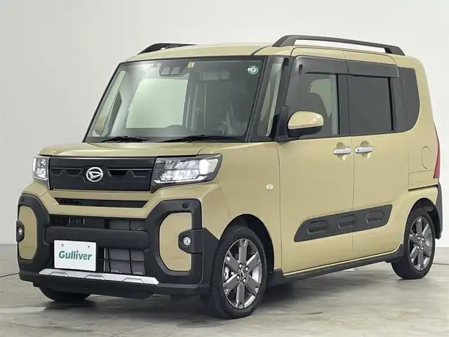 ダイハツ タント ファンクロスターボ 群馬県 2023(令5)年 2万km サンドベージュメタリック 社外８型ナビ　Ｂカメラ　スマアシ　衝突軽減　レーンキープ　ＡＨＢ　コーナーセンサー　社外電子ミラー　前後ドラレコ　ビルトインＥＴＣ　シートヒーター　ＬＥＤヘッド　プッシュスタート　純正アルミ　禁煙車