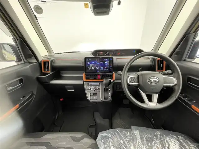 ダイハツ タント ファンクロスターボ 群馬県 2023(令5)年 2万km サンドベージュメタリック 社外８型ナビ　Ｂカメラ　スマアシ　衝突軽減　レーンキープ　ＡＨＢ　コーナーセンサー　社外電子ミラー　前後ドラレコ　ビルトインＥＴＣ　シートヒーター　ＬＥＤヘッド　プッシュスタート　純正アルミ　禁煙車