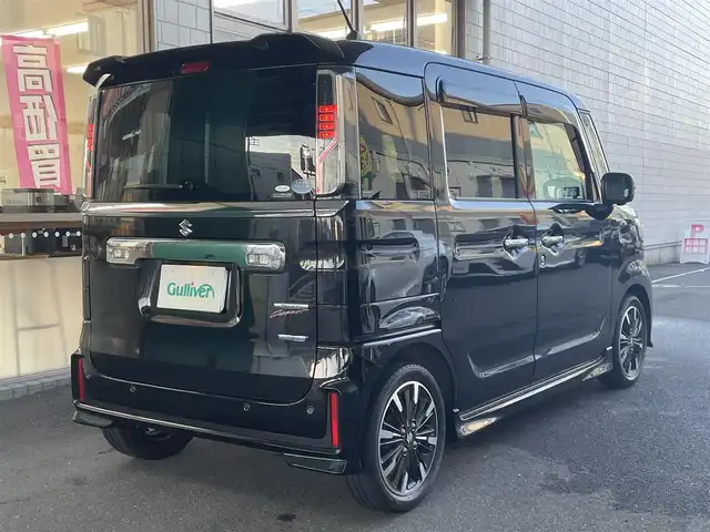 スズキ スペーシア カスタム HYBRID XS ターボ 愛知県 2018(平30)年 7万km ブルーイッシュブラックパール3 IC付ターボ/両側パワースライドドア/純正メモリナビ〈CN-RZ83〉/・DVD／Bluetooth／地デジTV/パノラミックビューモニター/クルーズコントロール/ヘッドアップディスプレ/合皮＆ファブリックコンビシート/運転席シートヒーター/LEDヘッドライト＆フォグランプ/サイドスポイラー＆リアスポイラー/エコクール／リアヒーターダクト/後席左右パーソナルテーブル/スズキセーフティサポート/・デュアルセンサーブレーキサポート/・誤発進抑制機能/・車線逸脱警報/・ふらつき警報/・先行車発進告知機能/・リアパーキングセンサー/ビルトインETC/GPSレーダー〈GWR81sd〉/前方ドライブレコーダー〈DRV517S〉/スマートキー＆プッシュスタート/純正15インチAW
