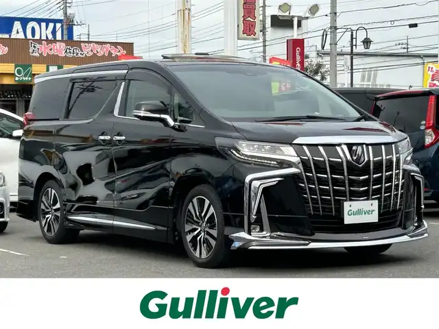 トヨタ アルファード S Cパッケージ 群馬県 2020(令2)年 5.7万km ブラック ツインムーンルーフ/モデリスタエアロ(F/S/R)/シグネチャーイルミブレード/純正10.1型SDナビ・フルセグTV/CD・DVD・BD・BT・Miracast/Apple CarPlay・Android Auto/JBLプレミアムサウンドシステム/13.3型リアエンターテインメントシステム/デジタルインナーミラー/黒革シート/前席パワーシート/前席エアシート・ヒーター/ステアリングヒーター/両側パワースライドドア/パワーバックドア/セーフティセンス/プリクラッシュセーフティ/レーダークルーズコントロール/レーントレーシングアシスト/アダプティブハイビームシステム/パーキングサポートブレーキ/ビルトインETC2.0/3眼LEDヘッドランプ/LEDフォグランプ/走行中視聴可能TVキット/取説・保証書/スマートキー×2