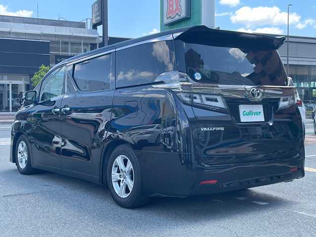 トヨタ ヴェルファイア X 大阪府 2020(令2)年 4.5万km ブラック ワンオーナー/純正ナビ（９インチディスプレイオーディオ）/AM/FM/Bluetooth/フルセグテレビ/DVD/バックカメラ/ETC2.0/プリクラッシュセーフティー/クリアランスソナー/レーントレーシングアシスト/ロードサインアシスト/プッシュスタート/オートライト/オートハイビーム/ブレーキホールド/ドライブレコーダー/（TZ-D２０６）/電動パーキングブレーキ/USB端子/パワースライドドア（左側のみ）/3列シート/ECOモード