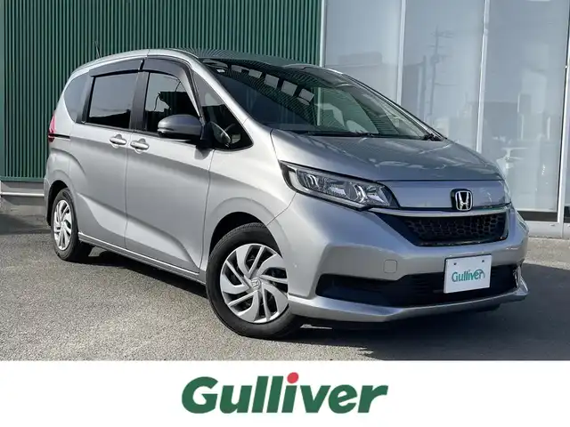 ホンダ フリード＋ G ホンダセンシング 福岡県 2021(令3)年 1.4万km ルナシルバーM レーンキープアシスト/横滑り防止/衝突軽減システム/アイドリングオフ/純正ドラレコ前後/純正ナビ/バックカメラ/ワンセグTV/両側パワスラ/純正ETC/純正アルミホイール/純正フロアマット/スマートキー/プッシュスタート