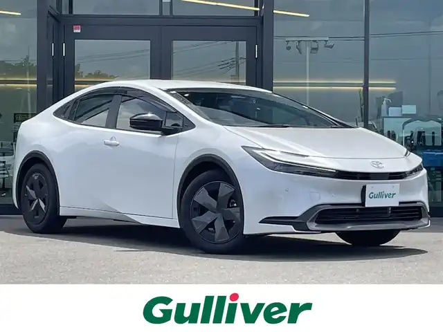 トヨタ プリウス U 東京都 2024(令6)年 1.5万km プラチナホワイトパールマイカ ディスプレイオーディオ/・コネクティッドナビ対応/・Bluetooth/・フルセグTV/バックカメラ/ETC2.0/前後ドライブレコーダー/AC100V電源1500W/シートヒーター/プリクラッシュセーフティ/レーダークルーズコントロール/レーントレーシングアシスト/車線維持支援機能/LEDヘッドライト/スマートキー/エンジンプッシュスタート