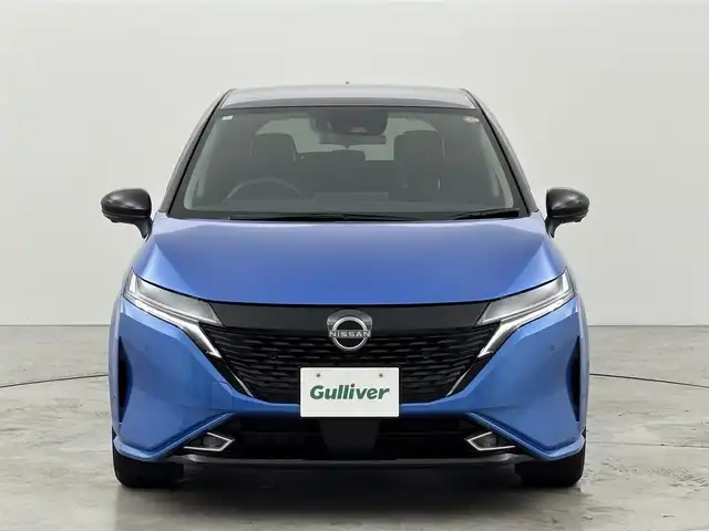 日産 オーラ G 福岡県 2024(令6)年 0.6万km ビビットブルー / スーパーブラック 2トーン ワンオーナー　/純正ナビ／フルセグTV/全方位カメラ　/ＢＯＳＥプレミアムサウンド　/ワイヤレス充電　/ビルトインＥＴＣ２．０　/デジタルインナーミラー　/前後ドライブレコーダー　/プロパイロット　/コーナーセンサー　/エマージェンシーブレーキ　/レーンキープ　/ＬＥＤヘッドライト