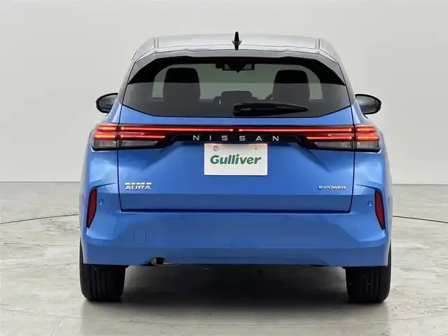 日産 オーラ G 福岡県 2024(令6)年 0.6万km ビビットブルー / スーパーブラック 2トーン ワンオーナー　/純正ナビ／フルセグTV/全方位カメラ　/ＢＯＳＥプレミアムサウンド　/ワイヤレス充電　/ビルトインＥＴＣ２．０　/デジタルインナーミラー　/前後ドライブレコーダー　/プロパイロット　/コーナーセンサー　/エマージェンシーブレーキ　/レーンキープ　/ＬＥＤヘッドライト