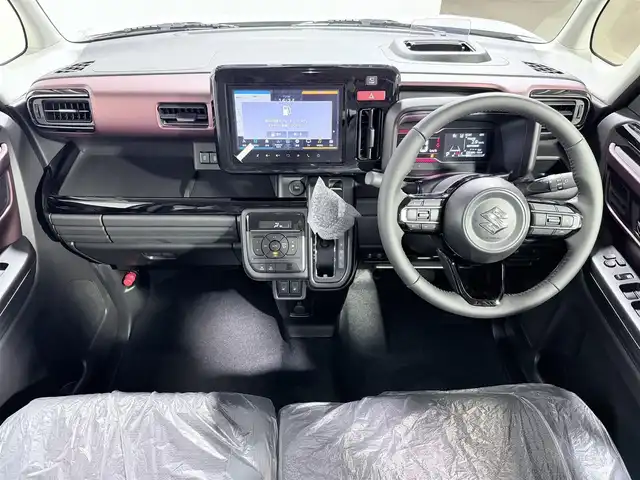 スズキ スペーシア カスタム HYBRID XS 大阪府 2025(令7)年 0.1千km ピュアホワイトパール/ブラック2トーン カスタム HV XS　全方位モニター付きメモリ-ナビゲーション・スズキコネクト対応通信機装着車(195800円)/レーダークルーズコントロール　コーナーセンサー　バックカメラ　レーンアシスト　全方位カメラ　ＬＥＤヘッドライト　プッシュスタート　衝突軽減　純正アルミホイール　フォグランプ　ハンドルヒーター 登録済未使用車 純正大型ナビ 両側電動