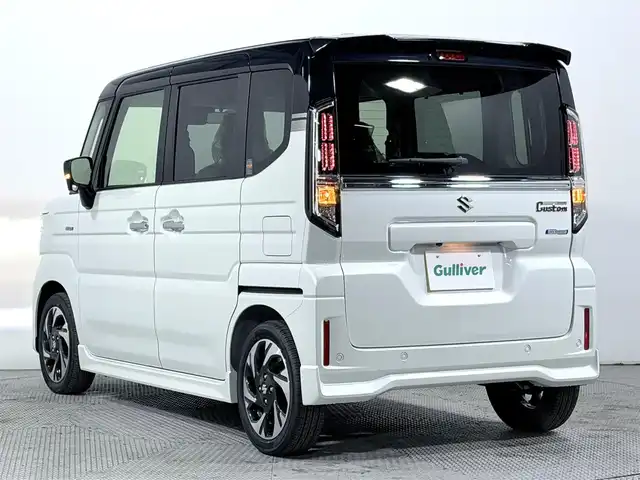 スズキ スペーシア カスタム HYBRID XS 大阪府 2025(令7)年 0.1千km ピュアホワイトパール/ブラック2トーン カスタム HV XS　全方位モニター付きメモリ-ナビゲーション・スズキコネクト対応通信機装着車(195800円)/レーダークルーズコントロール　コーナーセンサー　バックカメラ　レーンアシスト　全方位カメラ　ＬＥＤヘッドライト　プッシュスタート　衝突軽減　純正アルミホイール　フォグランプ　ハンドルヒーター 登録済未使用車 純正大型ナビ 両側電動