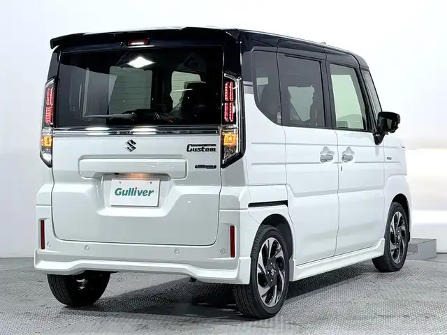 スズキ スペーシア カスタム HYBRID XS 大阪府 2025(令7)年 0.1千km ピュアホワイトパール/ブラック2トーン カスタム HV XS　全方位モニター付きメモリ-ナビゲーション・スズキコネクト対応通信機装着車(195800円)/レーダークルーズコントロール　コーナーセンサー　バックカメラ　レーンアシスト　全方位カメラ　ＬＥＤヘッドライト　プッシュスタート　衝突軽減　純正アルミホイール　フォグランプ　ハンドルヒーター 登録済未使用車 純正大型ナビ 両側電動