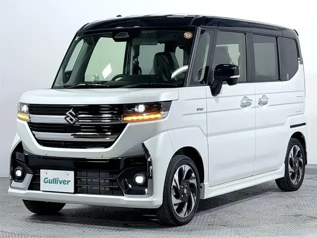 スズキ スペーシア カスタム HYBRID XS 大阪府 2025(令7)年 0.1千km ピュアホワイトパール/ブラック2トーン カスタム HV XS　全方位モニター付きメモリ-ナビゲーション・スズキコネクト対応通信機装着車(195800円)/レーダークルーズコントロール　コーナーセンサー　バックカメラ　レーンアシスト　全方位カメラ　ＬＥＤヘッドライト　プッシュスタート　衝突軽減　純正アルミホイール　フォグランプ　ハンドルヒーター 登録済未使用車 純正大型ナビ 両側電動