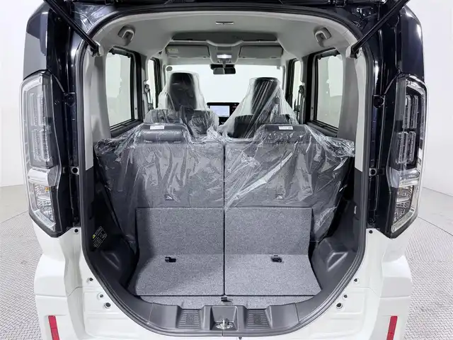 スズキ スペーシア カスタム HYBRID XS 大阪府 2025(令7)年 0.1千km ピュアホワイトパール/ブラック2トーン カスタム HV XS　全方位モニター付きメモリ-ナビゲーション・スズキコネクト対応通信機装着車(195800円)/レーダークルーズコントロール　コーナーセンサー　バックカメラ　レーンアシスト　全方位カメラ　ＬＥＤヘッドライト　プッシュスタート　衝突軽減　純正アルミホイール　フォグランプ　ハンドルヒーター 登録済未使用車 純正大型ナビ 両側電動