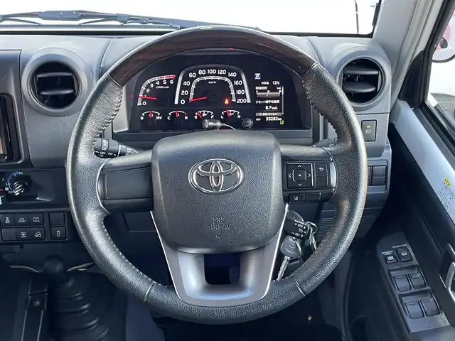 トヨタ ランドクルーザー AX 群馬県 2024(令6)年 3.4万km スーパーホワイトⅡ 7インチディスプレイオーディオ/バックカメラ/純正16インチアルミホイール/純正フロアマット/AHB/Bluetooth/スペアキー2本/ダウンヒルアシストコントロール/センターデフロック/寒冷地仕様/パワーステアリング/ETC/ターボ/４WD/電動格納ミラー/本革ステアリング/デジタルミラー