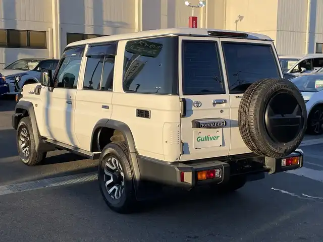 トヨタ ランドクルーザー AX 群馬県 2024(令6)年 3.4万km スーパーホワイトⅡ 7インチディスプレイオーディオ/バックカメラ/純正16インチアルミホイール/純正フロアマット/AHB/Bluetooth/スペアキー2本/ダウンヒルアシストコントロール/センターデフロック/寒冷地仕様/パワーステアリング/ETC/ターボ/４WD/電動格納ミラー/本革ステアリング/デジタルミラー