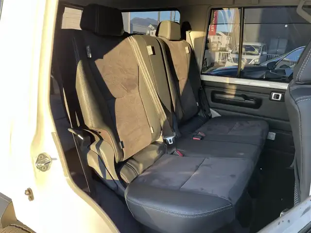 トヨタ ランドクルーザー AX 群馬県 2024(令6)年 3.4万km スーパーホワイトⅡ 7インチディスプレイオーディオ/バックカメラ/純正16インチアルミホイール/純正フロアマット/AHB/Bluetooth/スペアキー2本/ダウンヒルアシストコントロール/センターデフロック/寒冷地仕様/パワーステアリング/ETC/ターボ/４WD/電動格納ミラー/本革ステアリング/デジタルミラー