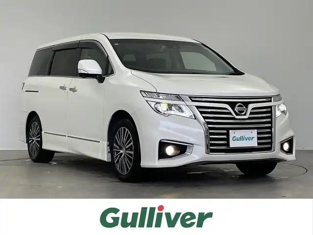 日産 エルグランド 250ハイウェイスターS 埼玉県 2019(平31)年 5.2万km ブリリアントホワイトパール ワンオーナー/ハーフレザーシート/純正メモリナビ/　DTV CD DVD BT SD HDDREC AUX/両側パワースライドドア/全方位バックカメラ/フリップダウンモニター/オットマン/インテリジェントクルーズコントロール/インテリジェントエマージェンシーブレーキ/LDW（車線逸脱警報）/VDC（ビークルダイナミクスコントロールシステム）/純正ビルトインETC/社外前後ドライブレコーダー/エンジンスタートボタン/スマートキー/スペアキー/純正LEDヘッドライト/オートライト/純正アルミホイール
