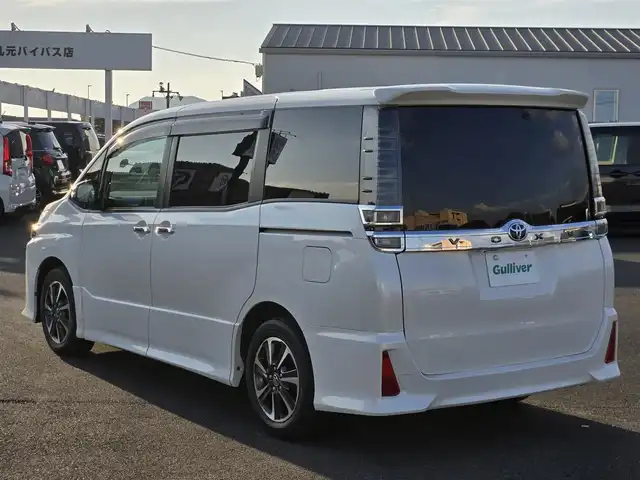 トヨタ ヴォクシー ZS 煌 鹿児島県 2019(平31)年 7.5万km ホワイトパールクリスタルシャイン 前後ＡＬＰＩＮＥナビ（ＢＩＧ－Ｘ１１）　/前後ドライブレコーダー　/ビルトインＥＴＣ　/クルーズコントロール　/両側パワースライドドア　/Ｂｌｕｅｔｏｏｔｈオーディオ　/フルセグテレビ　/社外デュアルホーン/純正アルミホイール(16インチ)/ＭＴモード付きＡＴ/横滑り防止装置/レーンキープアシスト/LEDヘッドライト/プッシュスタート/スマートキー