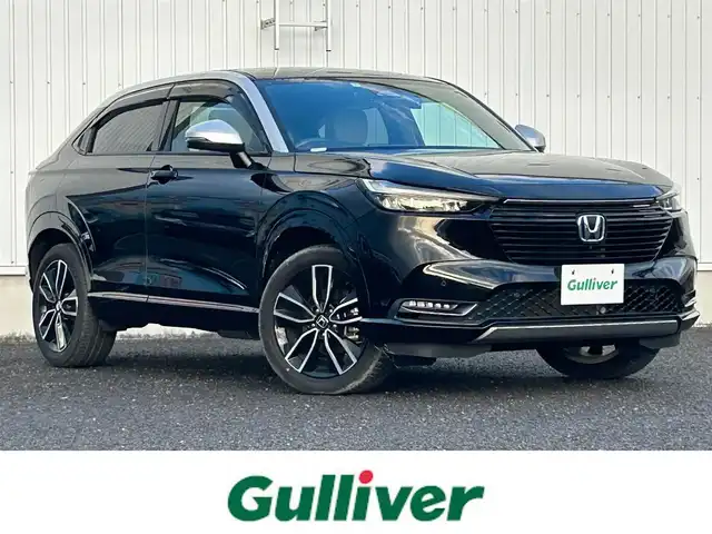 ホンダ ヴェゼル ハイブリッド e:HEV PLaY 熊本県 2021(令3)年 3.9万km クリスタルブラックパール 純正メモリーナビ/AM/FM/USB/Bluetooth/スマホ連携/オーディオアプリ/フルセグTV/ホンダセンシング/・路外逸脱抑制機能/・アダプティブクルーズコントロール/・ブラインドスポットインフォメーション/・踏み間違い衝突軽減システム/・衝突軽減ブレーキ/・パーキングセンサーシステム/・オートハイビーム/・後退出庫サポート/マルチビューカメラシステム/ヒルディセントコントロール/ハンズフリーパワーバックドア/パノラマルーフ/ワイヤレス充電器/LEDヘッドライト/・フォグランプ/・ヘッドライトレベライザー/革巻きステアリング/・ステアリングスイッチ/・ステアリングヒーター/・パドルシフト/電動格納ミラー/・ウィンカラーミラー/フロントデアイサ/電子パーキングブレーキ/・ブレーキホールド/プッシュスタートボタン/スマートキー/純正アルミホイール/純正ドアバイザー/純正フロアマット