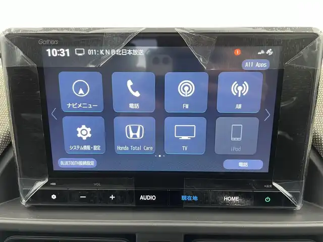 ホンダ フリード AIR 富山県 2025(令7)年 0.1万km プラチナホワイトパール 純正8型ナビ【LXM-245ZFEi】/（USB/BT/AM/FM）/フルセグTV/バックカメラ/衝突軽減ブレーキ/アダプティブクルーズコントロール/レーンキープアシスト/ブレーキホールド/横滑り防止装置/盗難防止装置/両側パワースライドドア/スマートキー×２/ドアバイザー/プッシュスタート/保証書