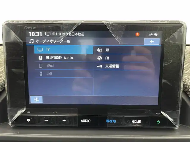 ホンダ フリード AIR 富山県 2025(令7)年 0.1万km プラチナホワイトパール 純正8型ナビ【LXM-245ZFEi】/（USB/BT/AM/FM）/フルセグTV/バックカメラ/衝突軽減ブレーキ/アダプティブクルーズコントロール/レーンキープアシスト/ブレーキホールド/横滑り防止装置/盗難防止装置/両側パワースライドドア/スマートキー×２/ドアバイザー/プッシュスタート/保証書