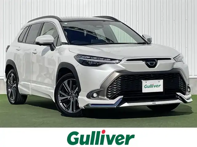 トヨタ カローラ クロス ハイブリッド Z 香川県 2024(令6)年 3万km プラチナホワイトパールマイカ 登録時走行距離；29227km/純正ナビ/全方位カメラ/モデリスタエアロ/ガラスルーフ/衝突被害軽減システム/ブラインドスポットモニター/クルーズコントロール/クリアランスソナー/電動リアゲート/パワーシート/シートヒーター/純正フロアマット/純正AW18インチ/スマートキー