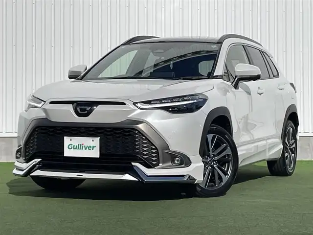 トヨタ カローラ クロス ハイブリッド Z 香川県 2024(令6)年 3万km プラチナホワイトパールマイカ 登録時走行距離；29227km/純正ナビ/全方位カメラ/モデリスタエアロ/ガラスルーフ/衝突被害軽減システム/ブラインドスポットモニター/クルーズコントロール/クリアランスソナー/電動リアゲート/パワーシート/シートヒーター/純正フロアマット/純正AW18インチ/スマートキー