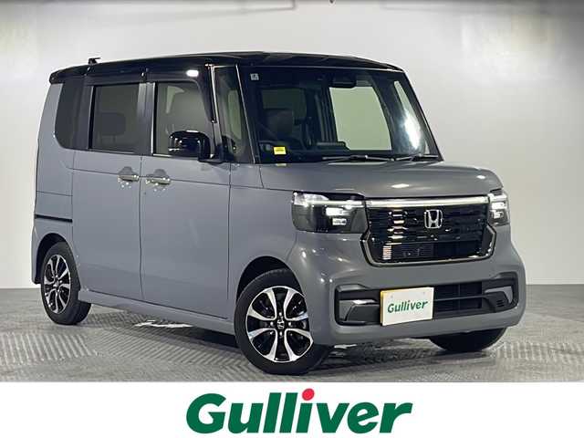 ホンダ Ｎ ＢＯＸ カスタム コーディネートスタイル 沖縄県 2024(令6)年 1.5万km グレーⅡ 県外仕入れ　/ワンオーナー　/禁煙車　/両側パワースライドドア　/純正８インチディスプレイオーディオ　/→【ＢT/ＦＭ/ＡＭ/USB/TypeCポート】/バックカメラ　/ETC/ホンダセンシング/→CMBC（衝突軽減ブレーキ）/→ACC（アダプティブ・クルーズ・コントロール）/→LKAS（車線維持支援システム９/→オートハイビーム/前席シートヒーター/革巻きステアリング/純正アルミ/純正フロアマット/プッシュスタート/スマートキー/　