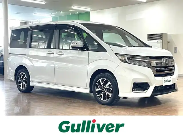 ホンダ ステップワゴン スパーダ クルスピセンシング 道央・札幌 2021(令3)年 3.3万km プラチナホワイトパール 4WD/寒冷地仕様/純正9インチナビ/・フルセグTV/CD/DVD/BT/SD/USB/バックカメラ/両側パワースライドドア/ハーフレザーシート/前席シートヒーター/ホンダセンシング/・衝突被害軽減ブレーキ/・誤発進抑制機能/・路外逸脱抑制機能/・先行車発進お知らせ機能/・標識認識機能/横滑り防止装置/アダプティブクルーズコントロール/ビルトインETC2.0/社外ドライブレコーダー/アイドリングストップ/プッシュスタート/スマートキーx2/ウインカーミラー/純正フロアマット/ドアバイザー/ステアリングリモコン/パドルシフト/オートライト/LEDヘッドライト/フォグライト/3列シート/わくわくゲート/純正16インチAW/新車時保証書/取扱説明書/ナビ取扱説明書