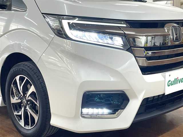 ホンダ ステップワゴン スパーダ クルスピセンシング 道央・札幌 2021(令3)年 3.3万km プラチナホワイトパール 4WD/寒冷地仕様/純正9インチナビ/・フルセグTV/CD/DVD/BT/SD/USB/バックカメラ/両側パワースライドドア/ハーフレザーシート/前席シートヒーター/ホンダセンシング/・衝突被害軽減ブレーキ/・誤発進抑制機能/・路外逸脱抑制機能/・先行車発進お知らせ機能/・標識認識機能/横滑り防止装置/アダプティブクルーズコントロール/ビルトインETC2.0/社外ドライブレコーダー/アイドリングストップ/プッシュスタート/スマートキーx2/ウインカーミラー/純正フロアマット/ドアバイザー/ステアリングリモコン/パドルシフト/オートライト/LEDヘッドライト/フォグライト/3列シート/わくわくゲート/純正16インチAW/新車時保証書/取扱説明書/ナビ取扱説明書