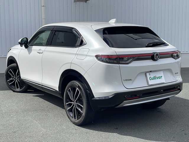 ホンダ ヴェゼル ハイブリッド e:HEV Z 三重県 2021(令3)年 5万km プラチナホワイトパール 純正ナビ/バックカメラ/BSM/前席シートヒーター/ワイヤレス充電器/電子パーキング/前後ドライブレコーダー/ステアリングヒーター/前後コーナーセンサー/デイライト/ビルトインETC2.0/革巻きステアリング/ステアリングリモコン/電動リヤゲート/純正フロアマット/レーダークルーズコントロール/パドルシフト/USB給電ポート/電動格納ミラー/禁煙車