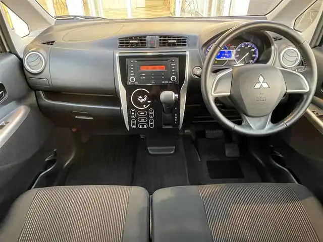 三菱 ｅＫカスタム G 道央・札幌 2014(平26)年 1.9万km シルキーホワイト ４WD/純正オーディオ/（CD/ラジオ）/自動防眩ルームミラー/バックカメラ/純正エンジンスターター/スマートキー/スペアキー/電動格納ミラー/ウィンカーミラー/純正AW夏タイヤ/社外AWスタッドレスタイヤ積込/シートヒーター/アイドリングストップ/プッシュスタート/革巻きステアリング/取扱説明書/保証書/記録簿