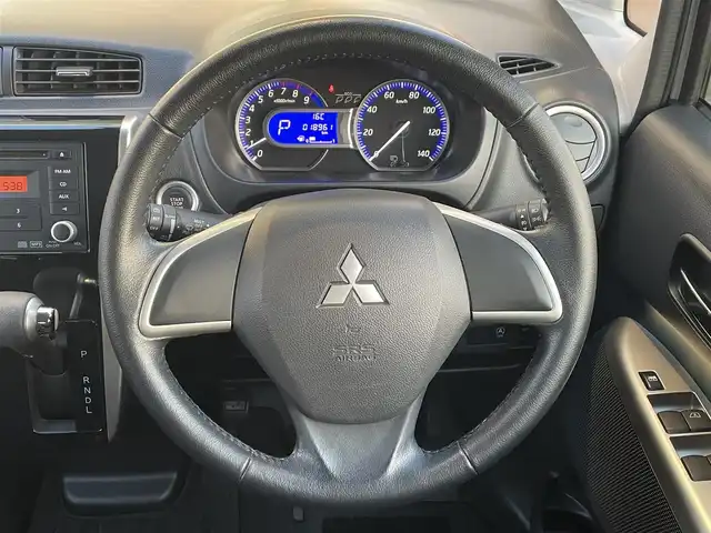 三菱 ｅＫカスタム G 道央・札幌 2014(平26)年 1.9万km シルキーホワイト ４WD/純正オーディオ/（CD/ラジオ）/自動防眩ルームミラー/バックカメラ/純正エンジンスターター/スマートキー/スペアキー/電動格納ミラー/ウィンカーミラー/純正AW夏タイヤ/社外AWスタッドレスタイヤ積込/シートヒーター/アイドリングストップ/プッシュスタート/革巻きステアリング/取扱説明書/保証書/記録簿