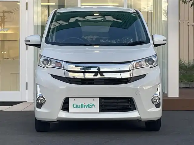 三菱 ｅＫカスタム G 道央・札幌 2014(平26)年 1.9万km シルキーホワイト ４WD/純正オーディオ/（CD/ラジオ）/自動防眩ルームミラー/バックカメラ/純正エンジンスターター/スマートキー/スペアキー/電動格納ミラー/ウィンカーミラー/純正AW夏タイヤ/社外AWスタッドレスタイヤ積込/シートヒーター/アイドリングストップ/プッシュスタート/革巻きステアリング/取扱説明書/保証書/記録簿