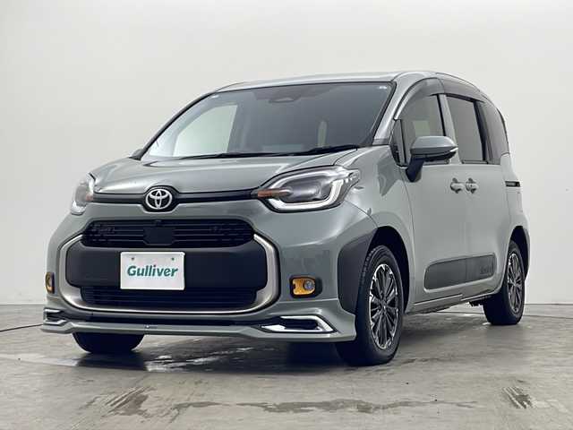 トヨタ シエンタ ハイブリッド Z 秋田県 2024(令6)年 1.8万km アーバンカーキ 4WD/純正ナビ/（FM/AM/Bluetooth/フルセグTV）/全方位カメラ/バックカメラ/両側パワースライドドア/モデリスタフロントエアロ/横滑り防止装置/レーダークルーズコントロール/衝突軽減装置/レーンキープアシスト/アイドリングストップ/ビルトインETC2.0/ステアリングリモコン/前席シートヒーター/ドアミラーヒーター/LEDヘッドライト/オートライト/オートハイビーム/プッシュスタート/スマートキー/スペアキー/電動格納ミラー/純正アルミホイール/純正フロアマット