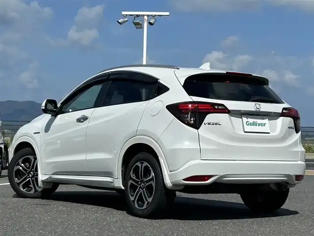 ホンダ ヴェゼル ハイブリッド Z ホンダセンシング 島根県 2018(平30)年 11.8万km プラチナホワイトパール 登録時走行距離118051km/純正ナビ/フルセグテレビ/バックカメラ/衝突軽減ブレーキ/レーダークルーズコントロール/レーンキープアシススト/プッシュスタート/スマートキー(スペアスマート×1)/パドルシフト/LEDヘッドライト/前席シートヒーター/ドラレコ/ETC
