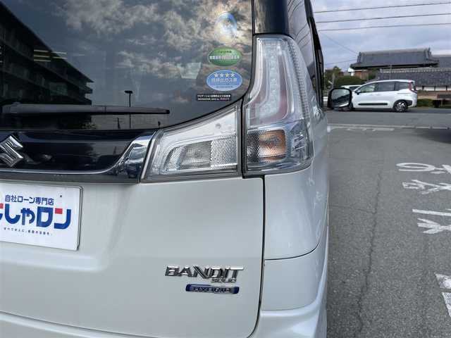 スズキ ソリオ バンディット HV MV Dカメラ ブレーキS 兵庫県 2016(平28)年 9.9万km ピュアホワイトP Ｄ席シートヒーター/純正メモリナビ＆フルセグＴＶ/　（ＤＶＤ＆ＣＤ＆ＢＴ）/バックカメラ/ビルトインＥＴＣ/アイドリングストップ/クルーズコントロール/衝突軽減システム/レーンキープアシスト/２列目サンシェード/盗難防止装置/左側パワースライドドア/純正エアロ/純正１５inアルミホイール/オートライト/ＬＥＤライト/フォグランプ/スマートキー/プッシュスタート/Ｗ＆サイドエアバッグ/横滑り防止装置/ＡＢＳ/ドアバイザー/フロアマット/新車保証書/取扱説明書/スマートスペアキー有