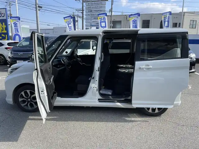 スズキ ソリオ バンディット HV MV Dカメラ ブレーキS 兵庫県 2016(平28)年 9.9万km ピュアホワイトP Ｄ席シートヒーター/純正メモリナビ＆フルセグＴＶ/　（ＤＶＤ＆ＣＤ＆ＢＴ）/バックカメラ/ビルトインＥＴＣ/アイドリングストップ/クルーズコントロール/衝突軽減システム/レーンキープアシスト/２列目サンシェード/盗難防止装置/左側パワースライドドア/純正エアロ/純正１５inアルミホイール/オートライト/ＬＥＤライト/フォグランプ/スマートキー/プッシュスタート/Ｗ＆サイドエアバッグ/横滑り防止装置/ＡＢＳ/ドアバイザー/フロアマット/新車保証書/取扱説明書/スマートスペアキー有