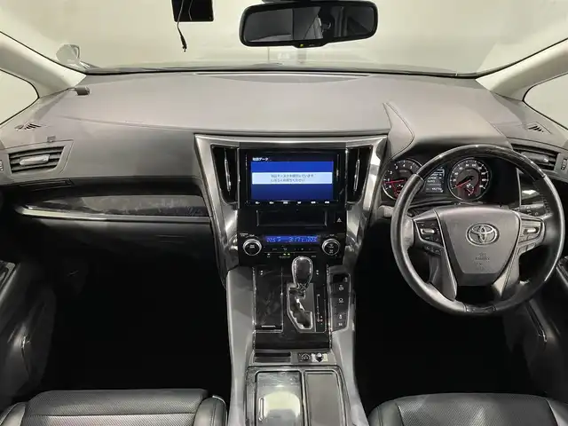 トヨタ ヴェルファイア Z Gエディション 愛知県 2019(平31)年 6.9万km スパークリングブラックパールクリスタルシャイン 純正９インチナビ　/（AM/FM/CD/DVD/フルセグTV/SD/Bluetooth/USB/HDMI）/純正12.1インチフリップダウンモニター　/トヨタセーフティセンス/　　-衝突軽減ブレーキ　/　　-レーダークルーズコントロール/　　-レーントレーニングアシスト/　　-ロードサインアシスト/　　-アダプティブハイビームシステム/両側電動スライドドア　/ビルトインＥＴＣ２．０　/シートヒーター　/エアーシート　/ＬＥＤヘッドライト　/LEDフォグランプ/電動バックドア/バックカメラ　/ステアリングヒーター/ドライブレコーダー/パワーシート/コーナーセンサー/プッシュスタート/スマートキー/純正フロアマット/純正18インチアルミホイール/オートライト