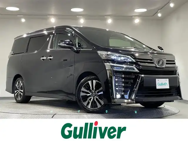 トヨタ ヴェルファイア Z Gエディション 愛知県 2019(平31)年 6.9万km スパークリングブラックパールクリスタルシャイン 純正９インチナビ　/（AM/FM/CD/DVD/フルセグTV/SD/Bluetooth/USB/HDMI）/純正12.1インチフリップダウンモニター　/トヨタセーフティセンス/　　-衝突軽減ブレーキ　/　　-レーダークルーズコントロール/　　-レーントレーニングアシスト/　　-ロードサインアシスト/　　-アダプティブハイビームシステム/両側電動スライドドア　/ビルトインＥＴＣ２．０　/シートヒーター　/エアーシート　/ＬＥＤヘッドライト　/LEDフォグランプ/電動バックドア/バックカメラ　/ステアリングヒーター/ドライブレコーダー/パワーシート/コーナーセンサー/プッシュスタート/スマートキー/純正フロアマット/純正18インチアルミホイール/オートライト