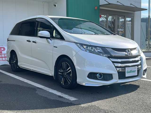 ホンダ オデッセイ ハイブリッド アブソルートセンシングEXパック 京都府 2016(平28)年 7.6万km ホワイトオーキッドパール 純正インターナビ/フルセグ/Bluetooth/ホンダセンシング　/フリップダウンモニター　/全方位カメラ　/両側電動スライドドア　/レーダークルーズ/ブラインドスポットモニター　/禁煙車　/ＥＴＣ　/ドライブレコーダー　/純正アルミ