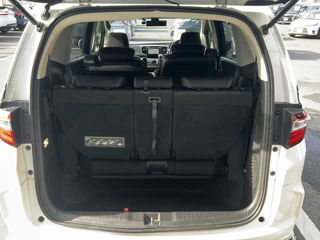 ホンダ オデッセイ ハイブリッド アブソルートセンシングEXパック 京都府 2016(平28)年 7.6万km ホワイトオーキッドパール 純正インターナビ/フルセグ/Bluetooth/ホンダセンシング　/フリップダウンモニター　/全方位カメラ　/両側電動スライドドア　/レーダークルーズ/ブラインドスポットモニター　/禁煙車　/ＥＴＣ　/ドライブレコーダー　/純正アルミ