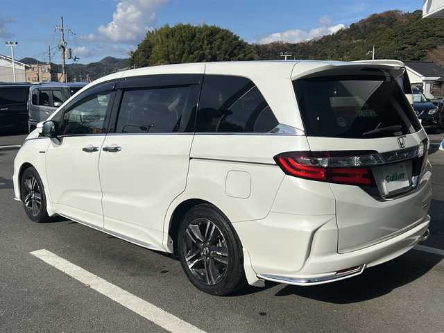 ホンダ オデッセイ ハイブリッド アブソルートセンシングEXパック 京都府 2016(平28)年 7.6万km ホワイトオーキッドパール 純正インターナビ/フルセグ/Bluetooth/ホンダセンシング　/フリップダウンモニター　/全方位カメラ　/両側電動スライドドア　/レーダークルーズ/ブラインドスポットモニター　/禁煙車　/ＥＴＣ　/ドライブレコーダー　/純正アルミ