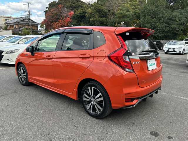 ホンダ フィット ハイブリット S ホンダセンシング 大阪府 2018(平30)年 4.8万km サンセットオレンジⅡ 純正ナビ/フルセグ/バックカメラ/ホンダセンシング/ドライブレコーダー/ビルトインETC/ステアリングスイッチ/パドルシフト/オートライト/スマートキー×2