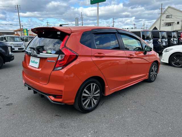 ホンダ フィット ハイブリット S ホンダセンシング 大阪府 2018(平30)年 4.8万km サンセットオレンジⅡ 純正ナビ/フルセグ/バックカメラ/ホンダセンシング/ドライブレコーダー/ビルトインETC/ステアリングスイッチ/パドルシフト/オートライト/スマートキー×2