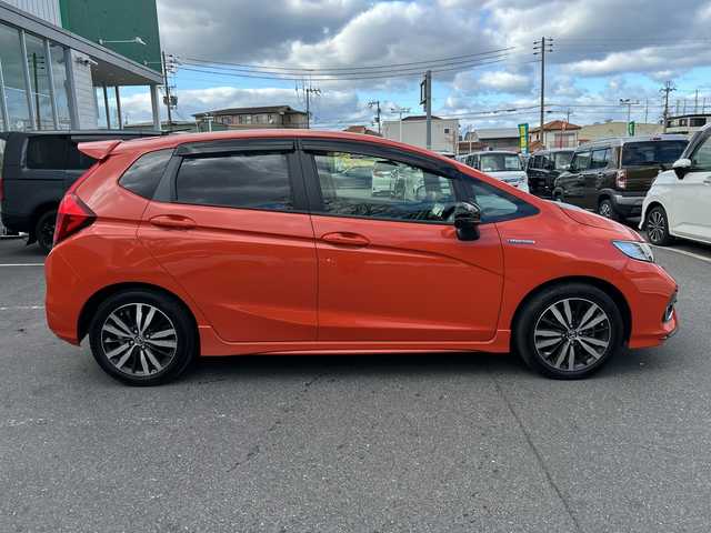 ホンダ フィット ハイブリット S ホンダセンシング 大阪府 2018(平30)年 4.8万km サンセットオレンジⅡ 純正ナビ/フルセグ/バックカメラ/ホンダセンシング/ドライブレコーダー/ビルトインETC/ステアリングスイッチ/パドルシフト/オートライト/スマートキー×2