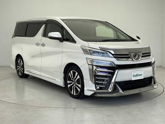 トヨタ ヴェルファイア Z Gエディション 千葉県 2018(平30)年 6.4万km ホワイトパールクリスタルシャイン 純正ナビNSZT-Z66T（ＣＤ・ＤＶＤ・フルセグ・ＢＴ・ＳＤ）/純正フリップダウンモニター（VRT-R66C）/バックカメラ　/ビルトインＥＴＣ　/社外前後ドライブレコーダー　/モデリスタエアロ（Ｆ・Ｓ・Ｒ）/運転席・助手席シートヒーター/運転席・助手席エアーシート/運転席・助手席パワーシート　/パワーバックドア/社外フロアマット/純正１８インチAW/前後クリアランスソナー/トヨタセーフティーセンス/プリクラッシュセーフティ/レーンキーピーングアシスト/レーンキープアシスト/アダブティブクルーズコントロール/ロードサインアシスト/オートマチックハイビーム/オートライト/LEDヘッドライト/フォグライト/スマートキー（スペアキー1本）/プッシュスタート/サイドバイザー