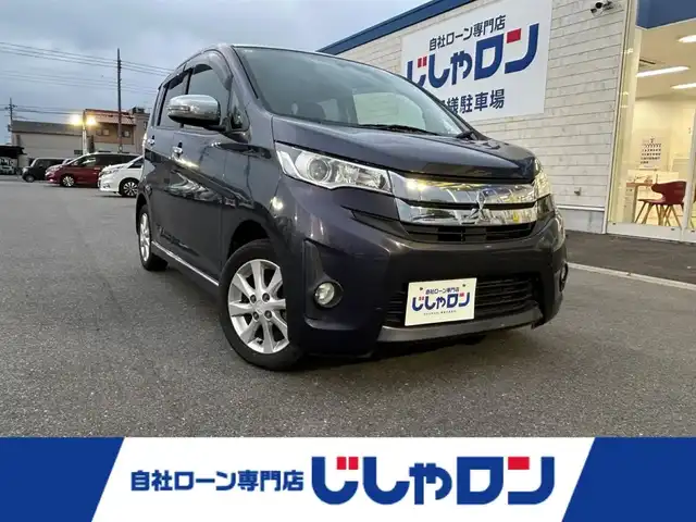 三菱 ｅＫカスタム G 群馬県 2013(平25)年 6.1万km パープリッシュネイビーパール (株)IDOMが運営する【じしゃロン伊勢崎店】の自社ローン専用車両になりますこちらは現金またはオートローンご利用時の価格です。自社ローンご希望の方は別途その旨お申付け下さい/純正ナビ/バックカメラ/スペアキー/純正アルミホイール/冬用タイヤ積載/ドアバイザー/電格ミラー