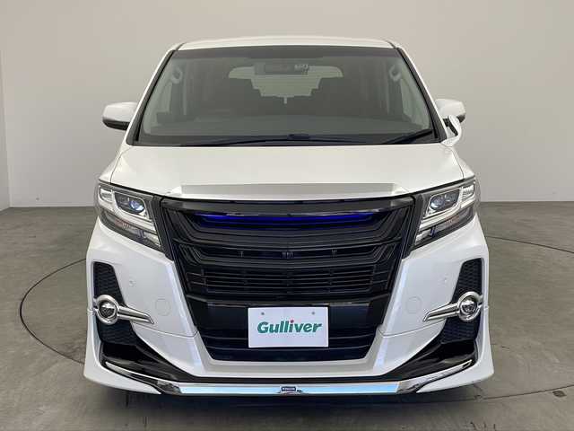 トヨタ アルファード SA 兵庫県 2015(平27)年 4.3万km ホワイトパールクリスタルシャイン ・純正ナビ&Bluetooth&CD&DVD&TV&SD/・純正リアフリップダウンモニター/・ビルトインETC/・バックカメラ/・クルーズコントロール/・前後コーナーセンサー/・オートライト/・オートマチックハイビーム/・LEDヘッドライト/・W＋サイドエアバッグ/・カーテンエアバッグ/・三列シート/・オットマンシート/・前後ドライブレコーダー/・純正フロアマット/・両側パワースライドドア/・社外２１インチアルミホイール/・モデリスタエアロパーツ/・nanoeエアコン/・スマートキー/・WACエアコン/・電動パーキングブレーキ/・ステアリングスイッチ/・ローダウン/・革巻きステアリング