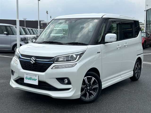 スズキ ソリオ バンディット HV SV 奈良県 2018(平30)年 4.2万km ピュアホワイトP 純正ナビ　/フルセグ　/DVD　/Bluetooth　/全方位カメラ　/USB入力端子　/ドライブレコーダー　/追従型クルーズコントロール/パドルシフト/両側パワースライドドア/ウォークスルー　/前席シートヒーター　/純正フロアマット　/純正アルミホイール/オートLEDライト/衝突被害軽減ブレーキ　/車線逸脱警報/横滑り防止装置/W+サイド+カーテンエアバッグ/スペアキー1本