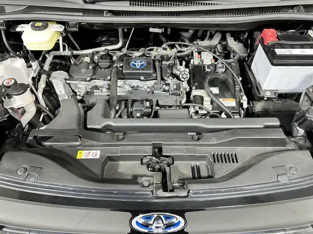 トヨタ ヴォクシー ハイブリッド S－Z 佐賀県 2022(令4)年 2.1万km アティチュードブラックマイカ 快適利便パッケージ/プロジェクター式LEDヘッドライト/純正10.5インチディスプレイオーディオ/ナビキット/フルセグ/CD/DVDデッキ/ビルトインETC2.0/ドライブレコーダー/両側パワースライドドア/パワーバックドア/シートヒーター/オットマン/トヨタセーフティセンス/プリクラッシュセーフティ/レーントレーシングアシスト/レーダークルーズコントロール/アダプティブハイビームシステム/クリアランスソナー